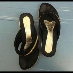 Black and golden footwear